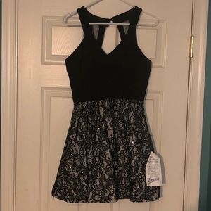 Homecoming Dress: Black with a sequined skirt